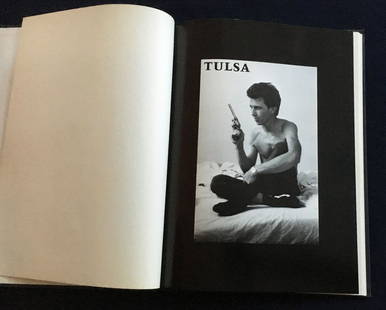 Larry Clark Tulsa. New York: 1971. First Edition.: Larry Clark NY 1971, (self-published). 1st hardcover edition. unpaginated, 53 b&w photographic plates. Silver-titled black cloth Fine. No DJ. A hardcover book in near new condition. B&W photographic p