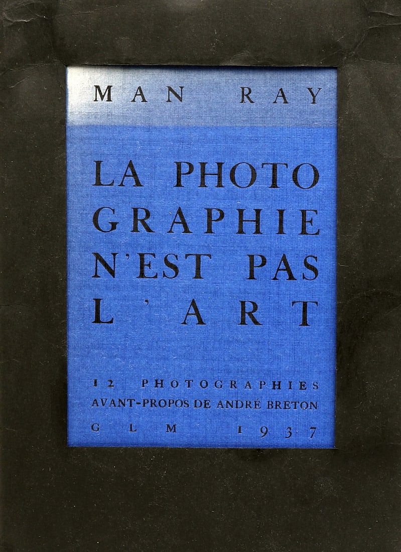 Man Ray. La photographie n’est pas de l' art. 1937.: Editions GLM, Paris 1937. Man Ray, Andre Breton. Portfolio book, presenting the combined work of Andre Breton and Man ray. The portfolio, loose as issued, includes twelve sheets of photo-toned reprodu