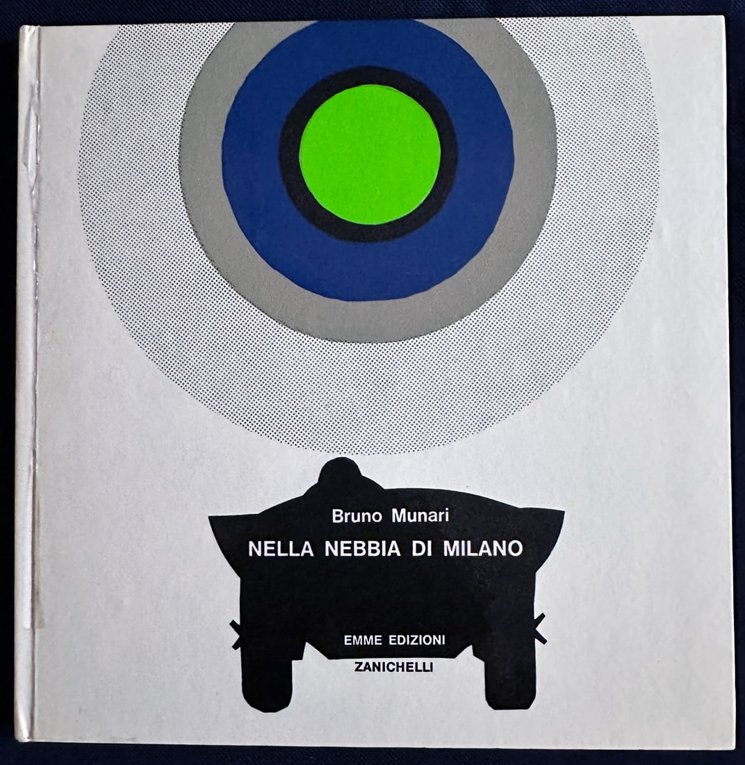Munari : Nella nebbia di Milano. 1968: EMME Edizioni 1968, Milano. Bruno Munari visual-narrative experimentation artfully printed by Giorgio Lucini. Made up of colored, glossy, opaque, overlapping papers of different sizes, colours, cuts a