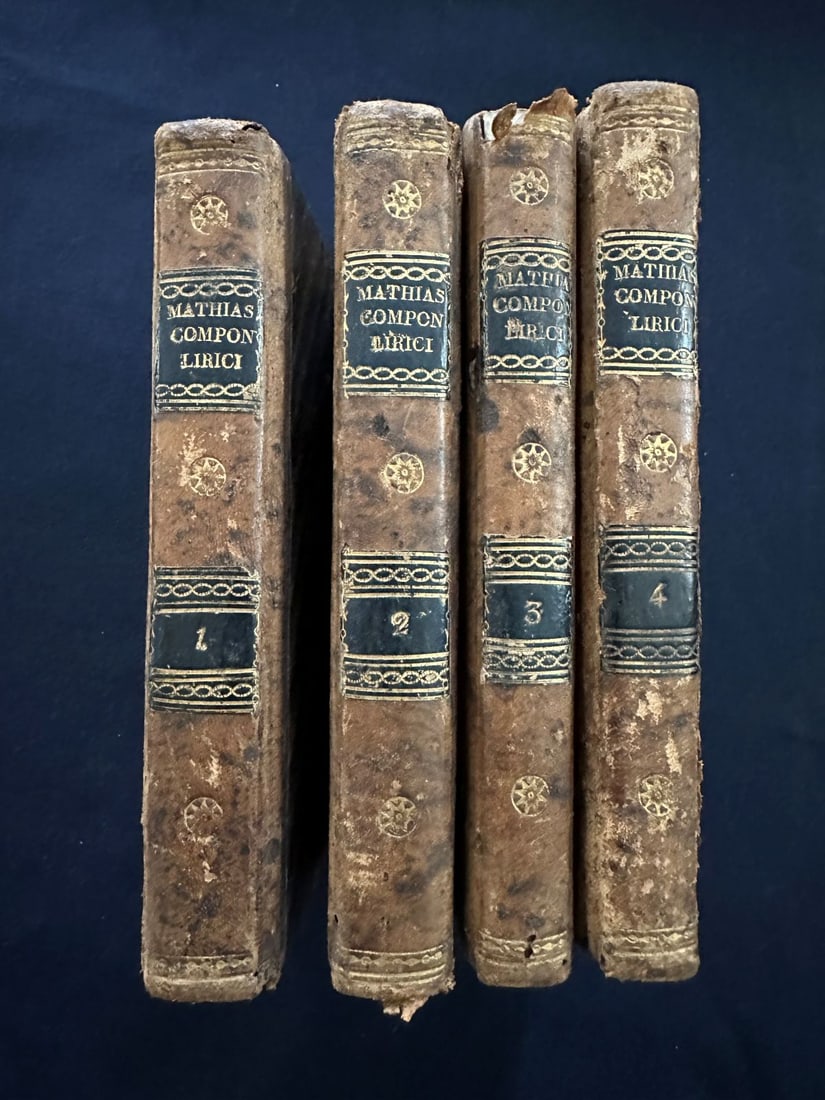 Componimenti lirici de’ piu illustri poeti d’Italia, by T. J. Mathias: New edition. Napoli 1819, presso Agnello Nobile. 4 volume set, 7 inches tall. Full vellum with gilt bands and twin labels. Armorial bookplate. Engraved frontispieces. The tiny blue ticket of P.