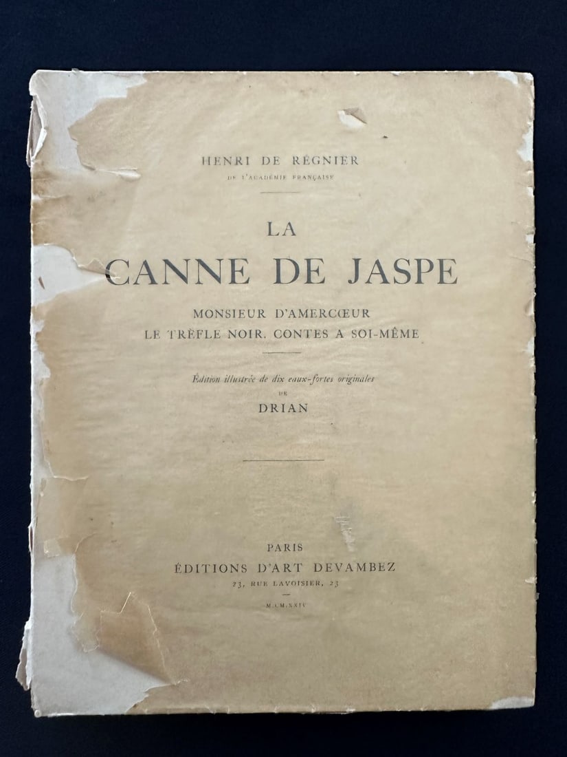La canne de Jaspe, by Henri de Régnier, 1924.: Editions d Art Devambez, Paris. With 10 original eaux-fortes by Drian. Soft cover with worn glassine. Limited edition, Exemplaire n. 529/585