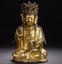 A Chinese gilt bronze figure of Maitreya from Ming