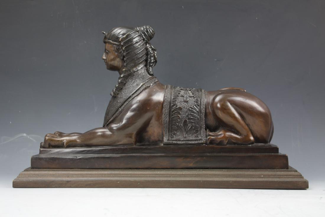 Bronze statue of Sphinx on wooden base (1 of 7)