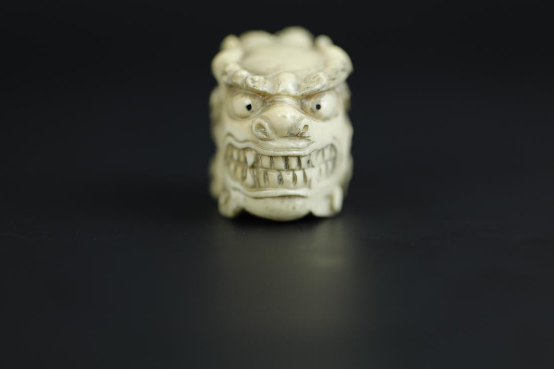 Japanese Netsuke carving of a foo lion's head (1 of 6)