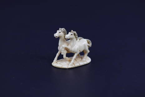 A Carved Netsuke of Two Horses Signed: H: 1.5 W: 1.75 Inche