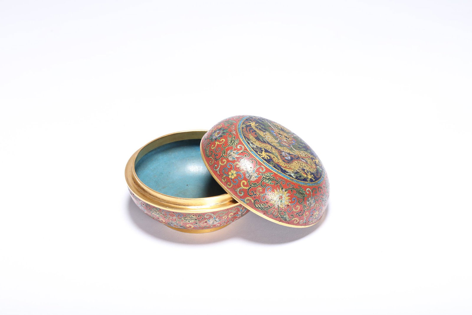 A Round Cloisonne Box with Dragon and Qianlong Mark: A Round Cloisonne Box with Dragon and Qianlong Mark. H: 2.6 in. (6.5 cm) D: 4.1 in. (10.4 cm)
