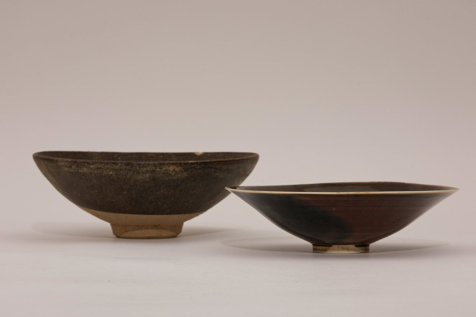 A Group of Two Brown-Glaze Tea Bowls: A Group of Two Brown-Glaze Tea Bowls. D: 6.8 in. (17 cm) D: 6 in. (15.2 cm)