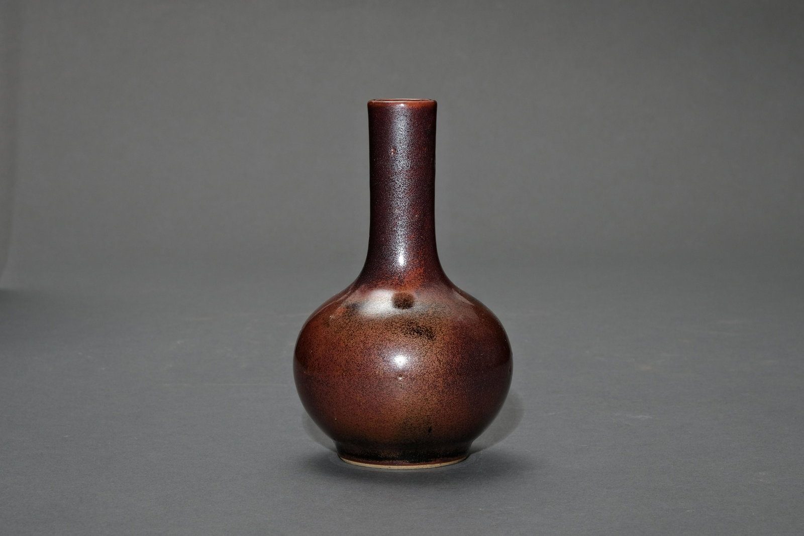 A Brown Glazed Bottle Vase: A Brown Glazed Bottle Vase. H: 5.5 in. (14 cm)