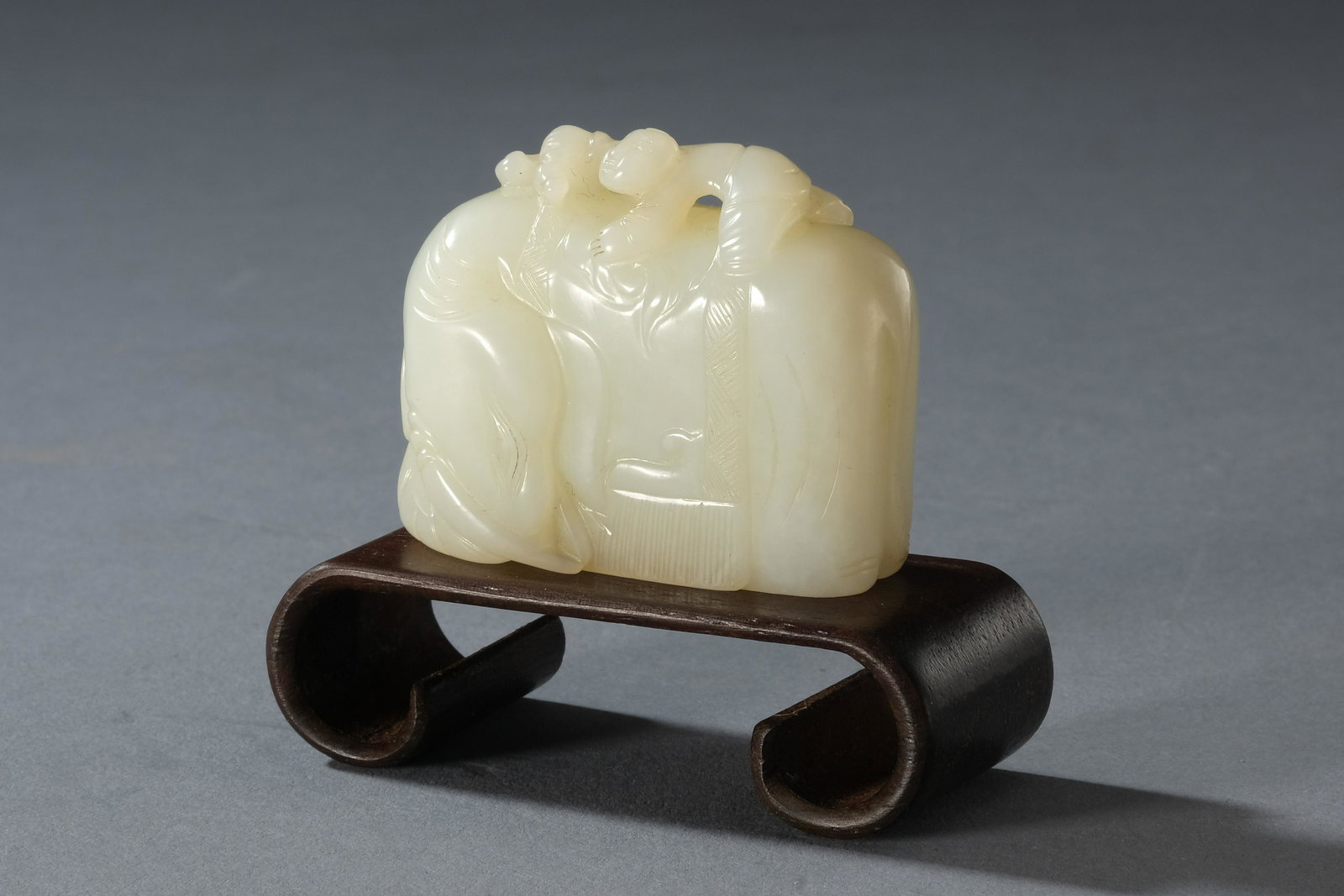 A Carved Hetian Jade Figure of Elephant: H: 1.7 in. (4.2 cm) W: 2 in. (5 cm) D: 0.7 in. (1.8 cm) We are not a professional appraisal agency nor restoration agency. The marking of the age and the review of the appearance are just our subjecti