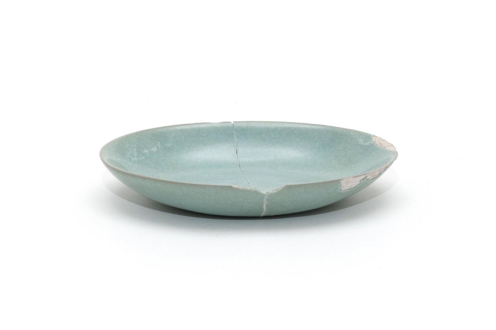 A Ru Glazed Crackle Bird and Flower Brush Washer: A Ru Glazed Crackle Bird and Flower Brush Washer. H: 1 in. (2.6 cm) L: 6.1 in. (15.4 cm) W: 4.2 in. (10.7 cm) We are not a professional appraisal agency nor restoration agency. The marking of the age 