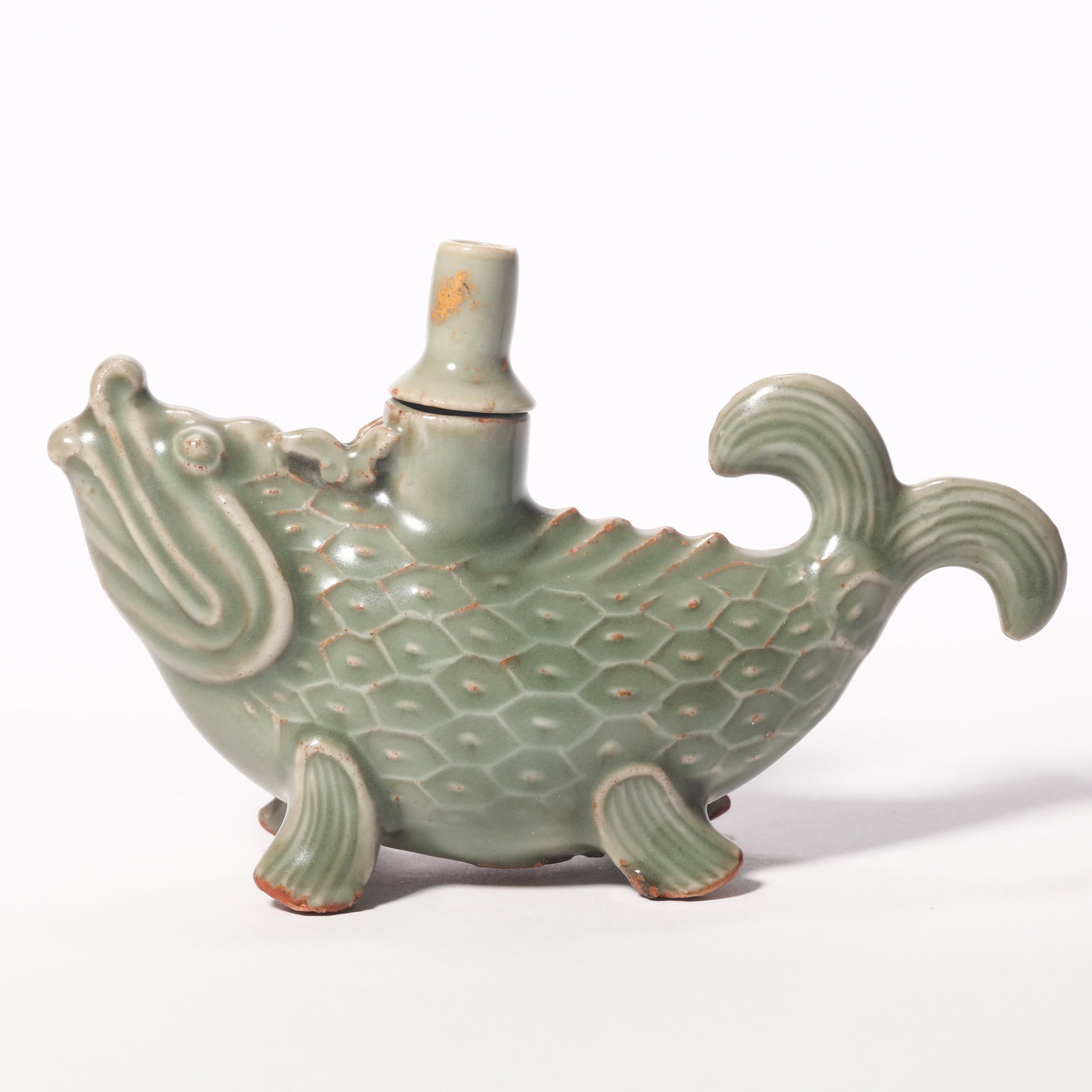 A Longquan Fish-Form Water Droplet Pot: A Longquan Fish-Form Water Droplet Pot. H: 3.1 in. (8 cm) D: 5.3 in. (13.5 cm)