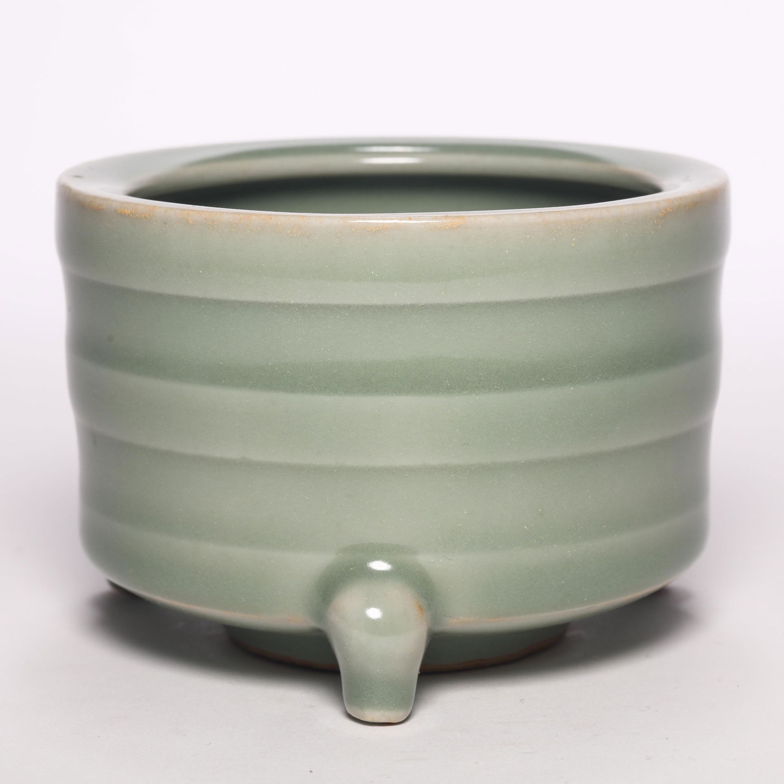 Longquan Celadon Tripod Censer: Longquan Celadon Tripod Censer. H: 2.6 in. (6.5 cm) D: 3.7 in (9.5 cm)