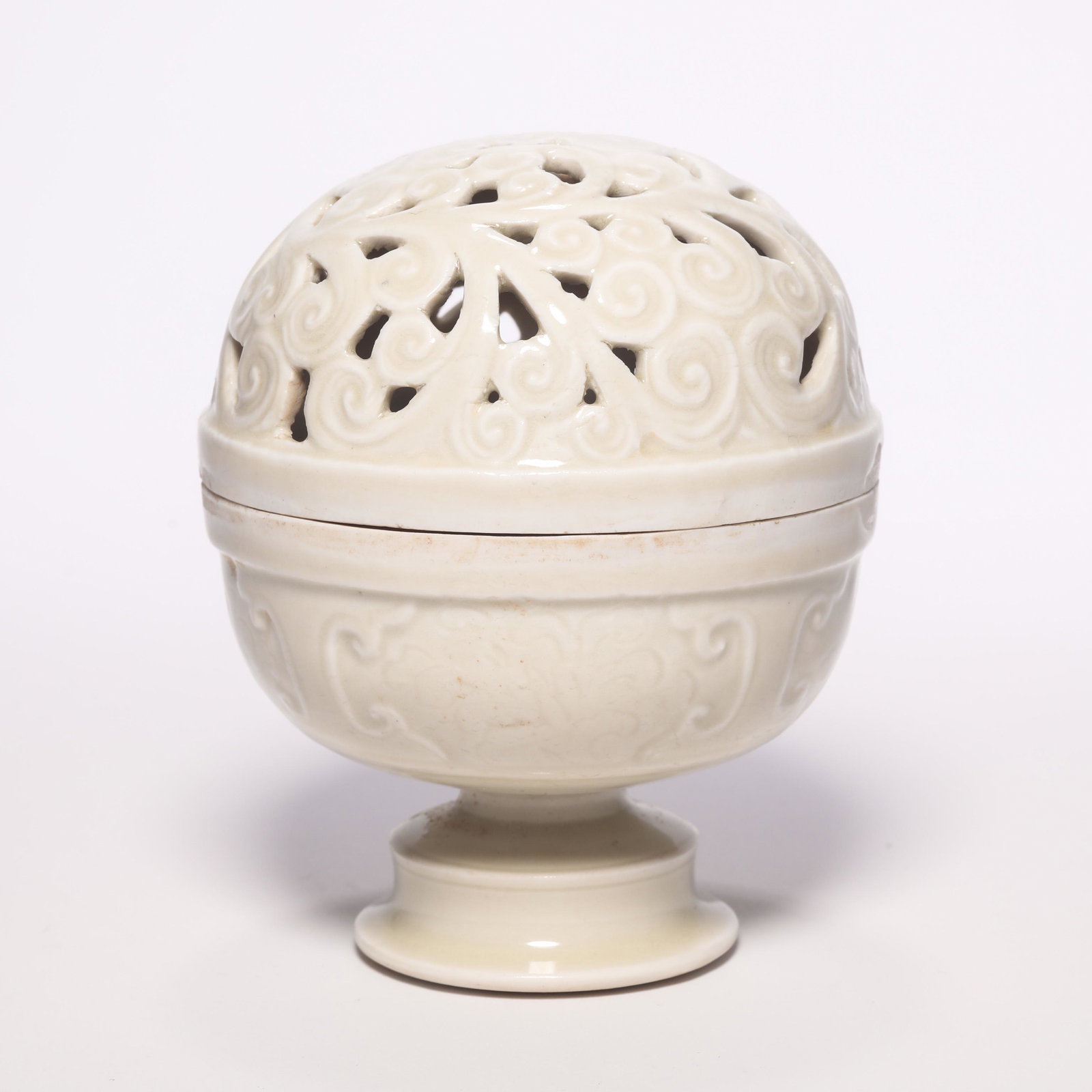 A Ding Ware Carved Censer: A Ding Ware Carved Censer. H: 3.9 in. (10 cm) D: 3.2 in (8.2 cm)