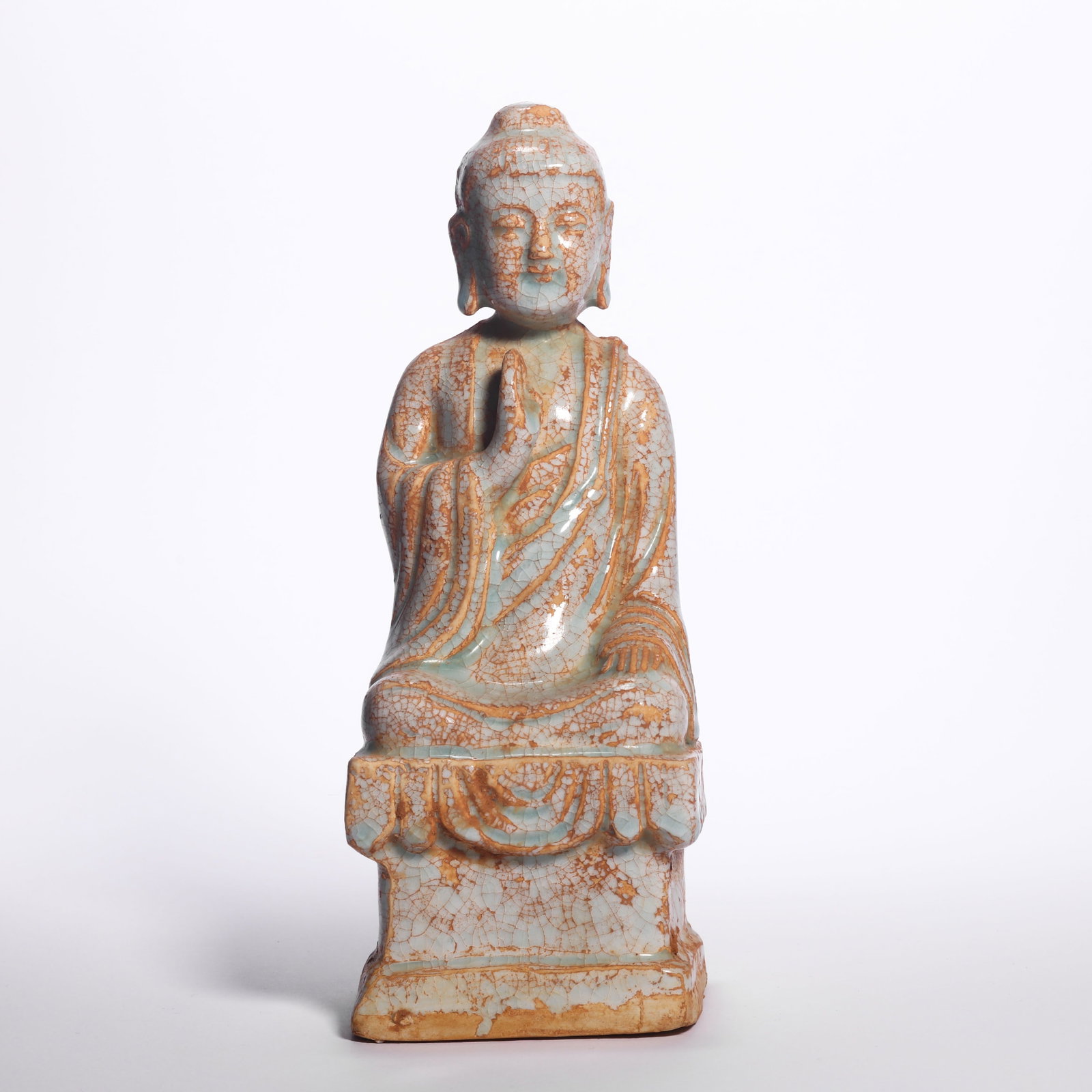 A Longquan Ware Crackled Buddha Figure: A Longquan Ware Crackled Buddha Figure. H: 9.8 in. (25 cm)