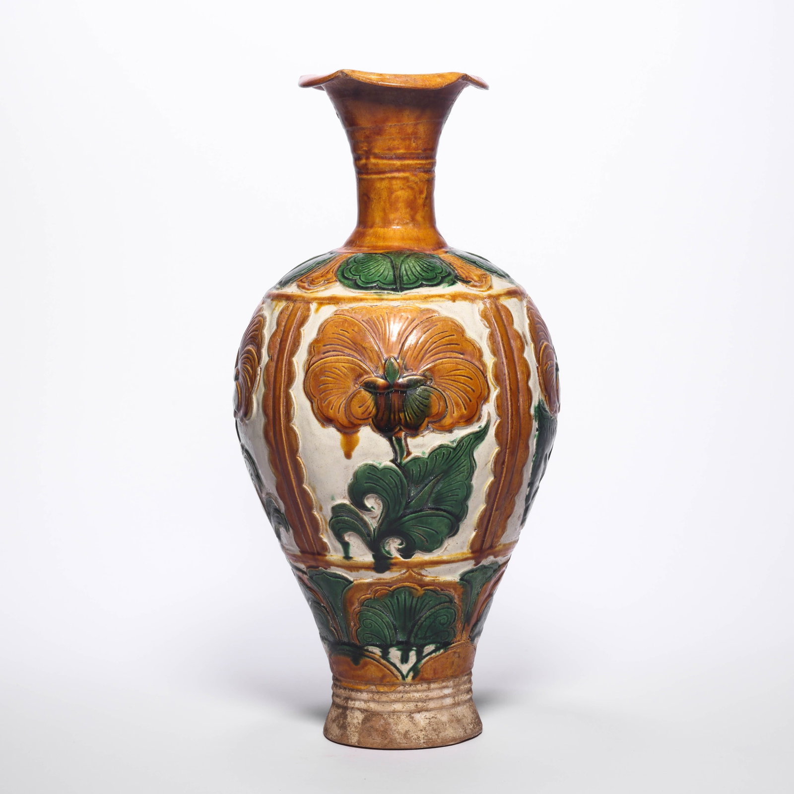 A Sancai Carved Floral Lobed Opening Vase: A Sancai Carved Floral Lobed Opening Vase. H: 12.6 in. (32 cm)