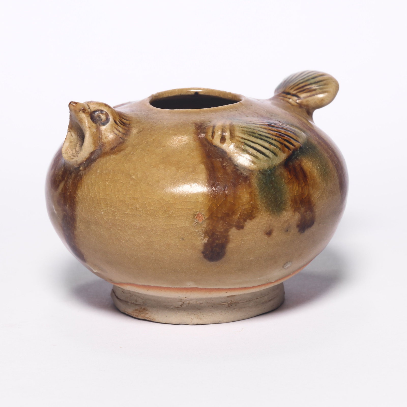 A Changsha Ware Bird-Form Water Droplet: A Changsha Ware Bird-Form Water Droplet. H: 3.7 in. (6.6 cm) D: 5.1 in (9.5 cm)