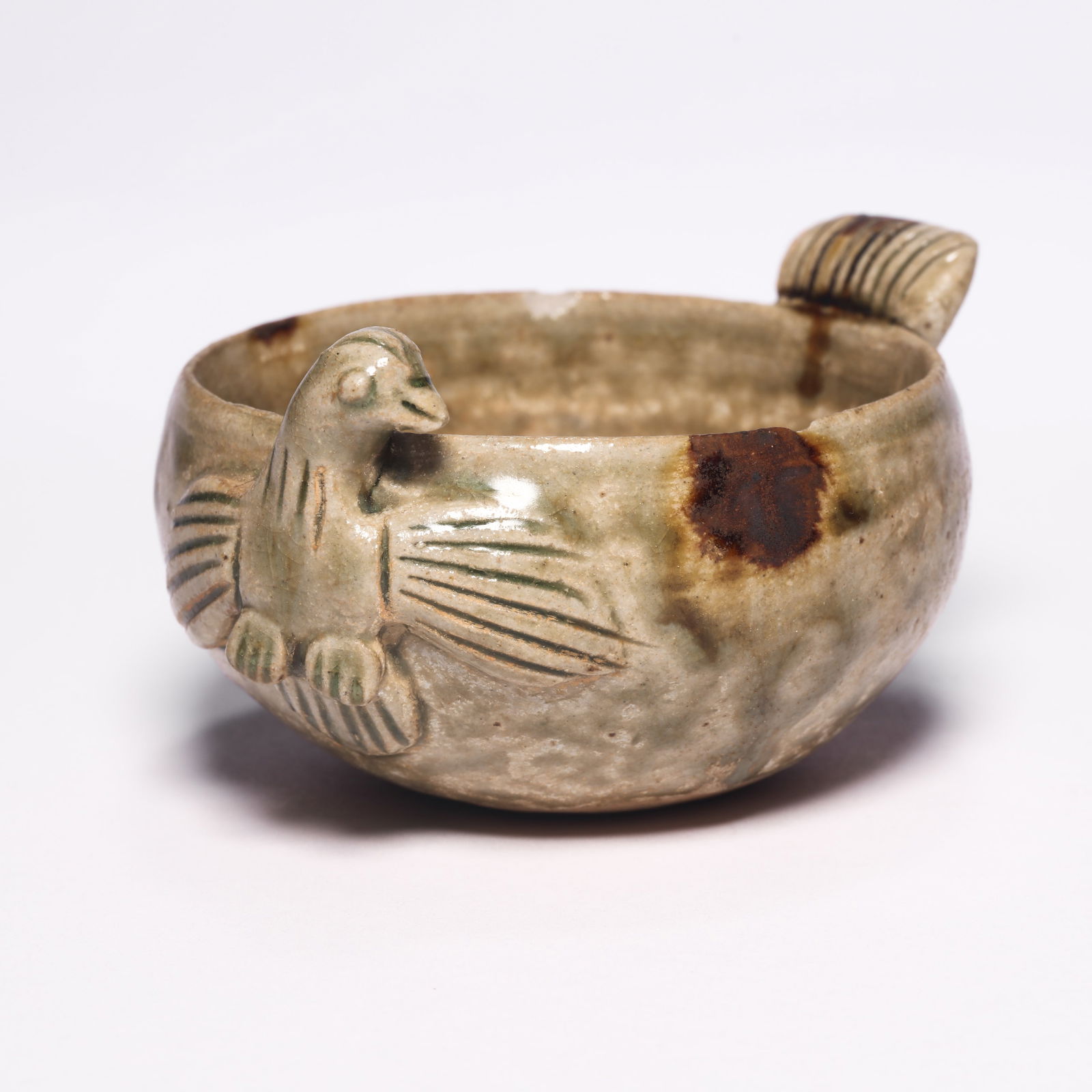 A XiangZhou Porcelain Bird Cup: A XiangZhou Porcelain Bird Cup. H: 1.9 in. (5 cm) D: 3.7 in (9 cm)