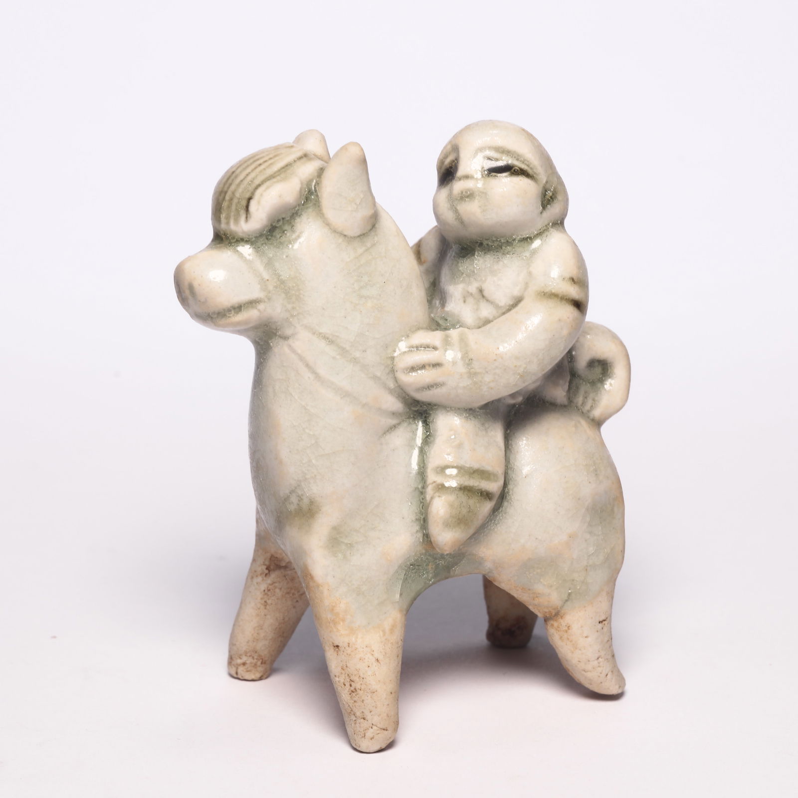 A Hutian Ware Ying-Qing-Glazed man on Lion Figure (1 of 8)