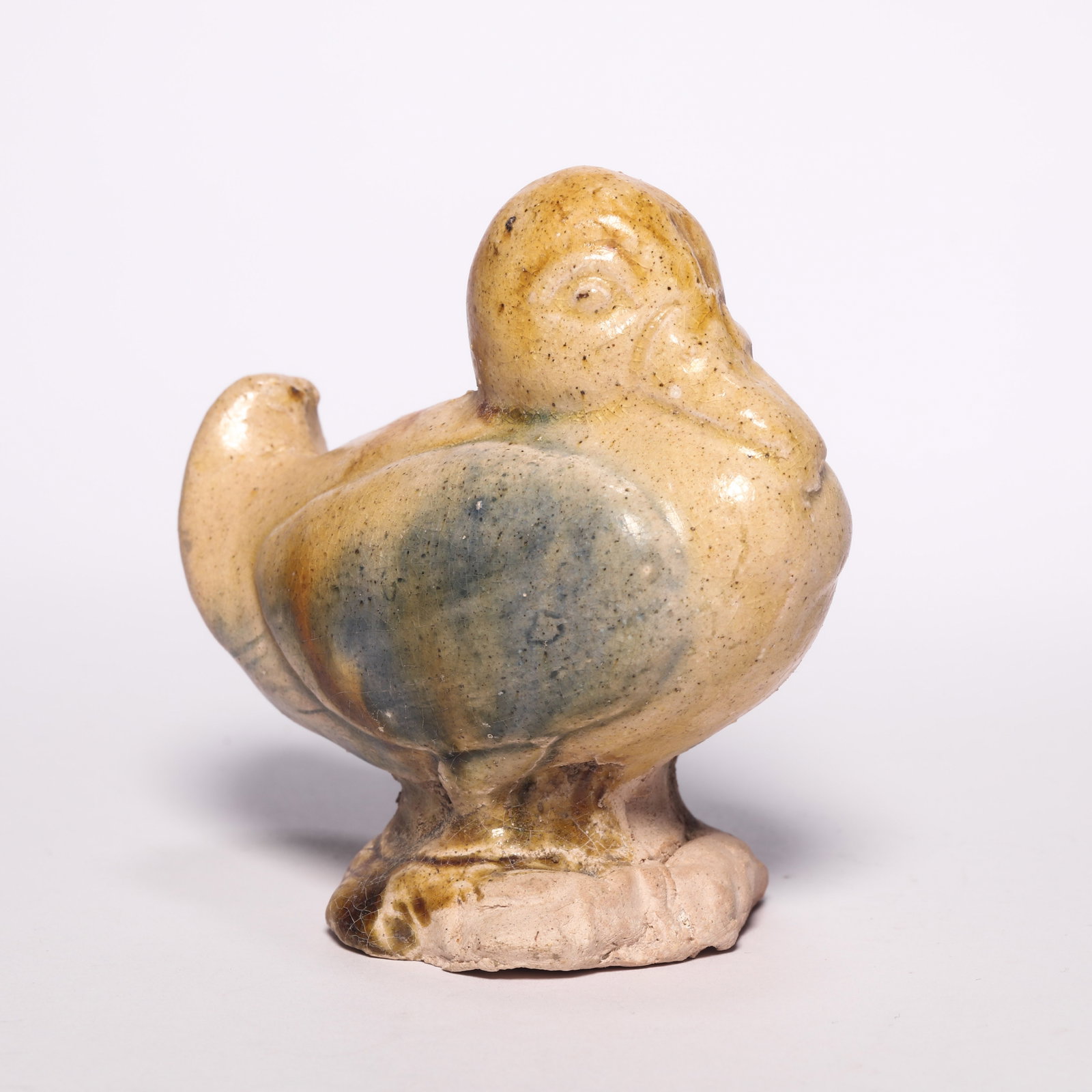 A Sancai Duck Figure: A Sancai Duck Figure. H: 2.9 in. (7.5 cm) D: 3.1 in. (8 cm)