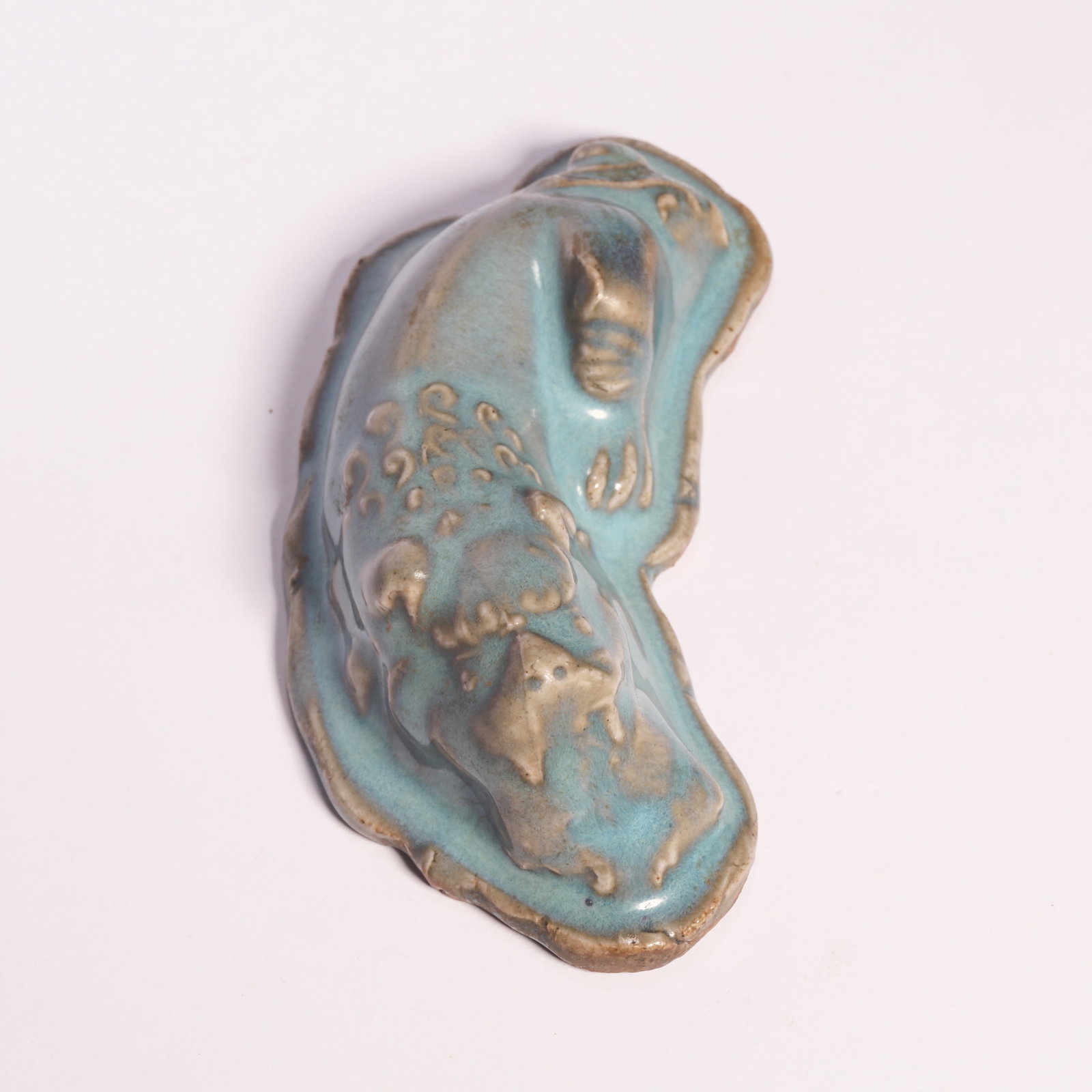 A Jun Ware Lion-Formed Brush Rest: A Jun Ware Lion-Formed Brush Rest. H: 1.6 in. (4 cm) D: 4.3 in. (11 cm)