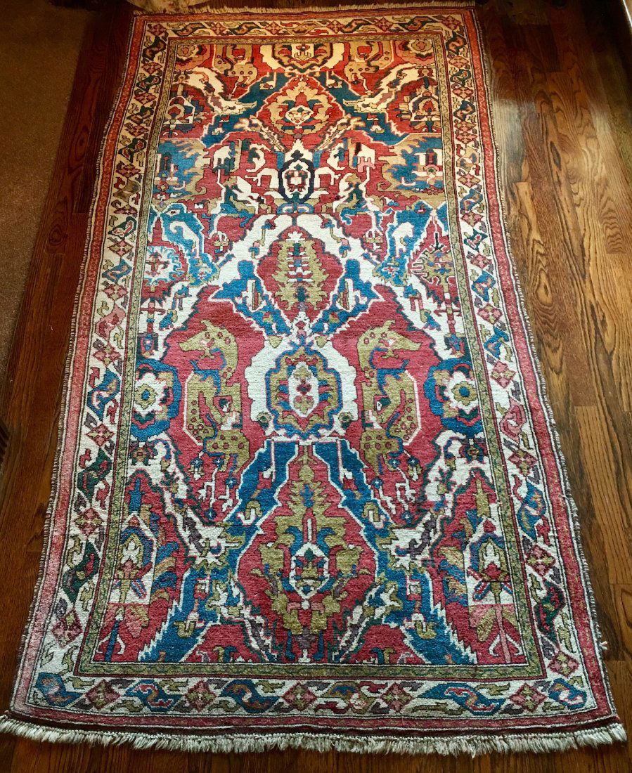 PERSIAN ANTIQUE DRAGON DESIGN RUG MEASURES 4' X 8'2": 4' X 8'2" PERSIAN ANTIQUE DRAGON DESIGN RUG CAUCASIAN CIRCA: 1910-1920's CAUCAUSUS REGION.