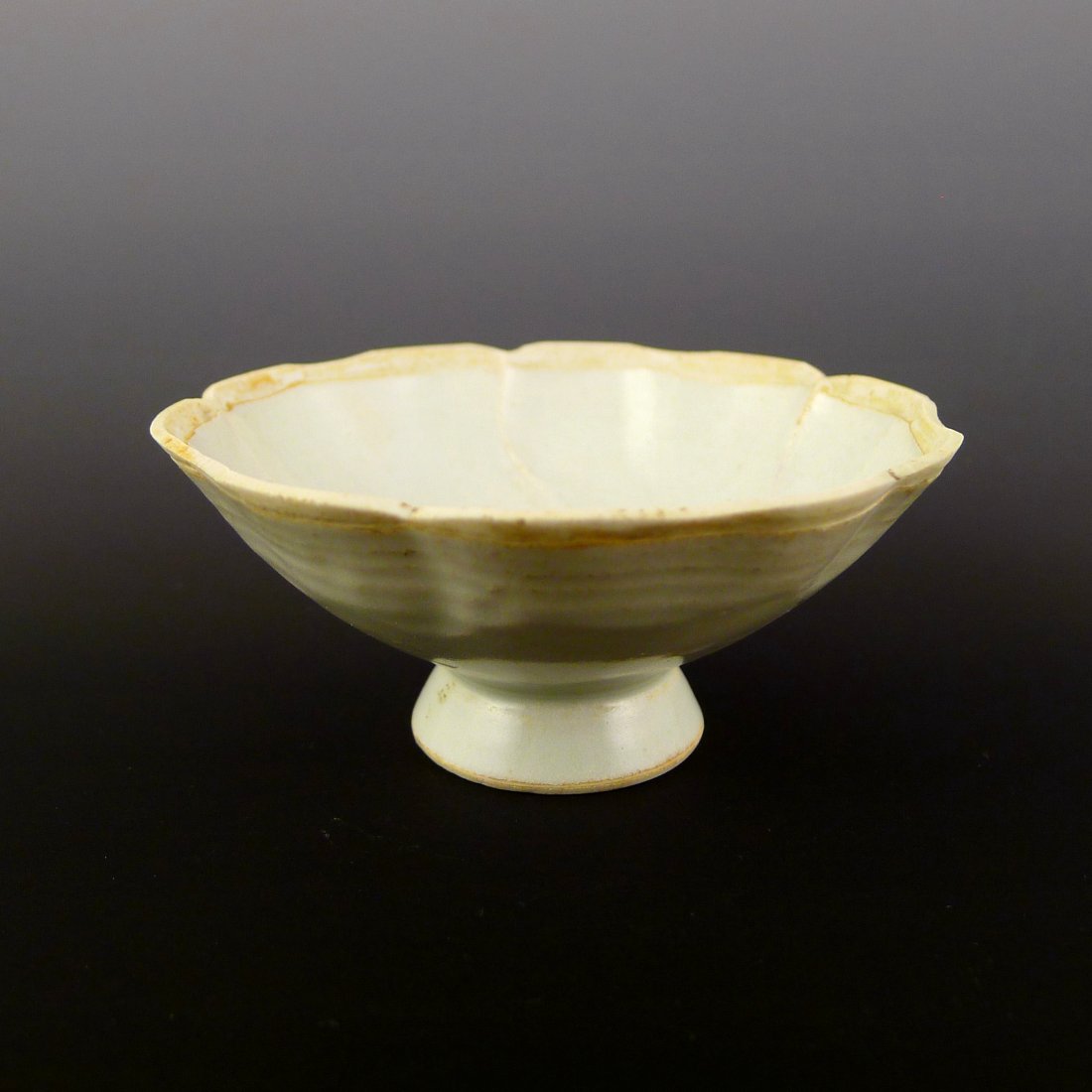 Song Dynasty Hutian Kiln High Heeled Bowl: 宋代湖田窑高足花口碗 Song Dynasty Hutian Kiln High Heeled Bowl;Dimension: height:1.6".