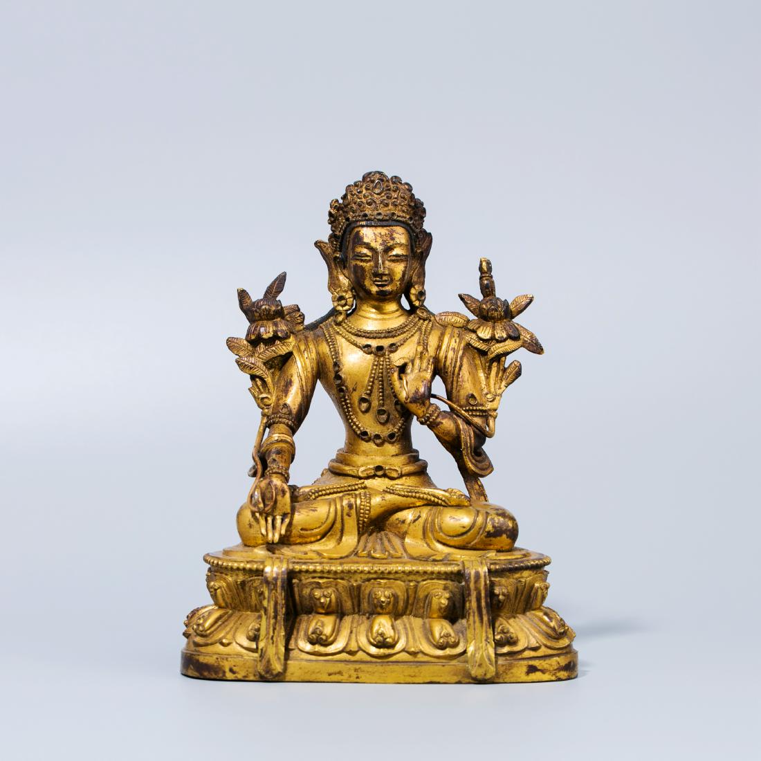 A Chinese Gilt Buddhist Bronze Seated Tara Sculpture (1 of 8)