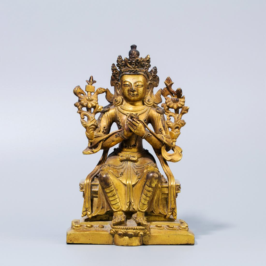 A Chinese Gilt Buddhist Bronze Seated Tara Sculpture (1 of 8)