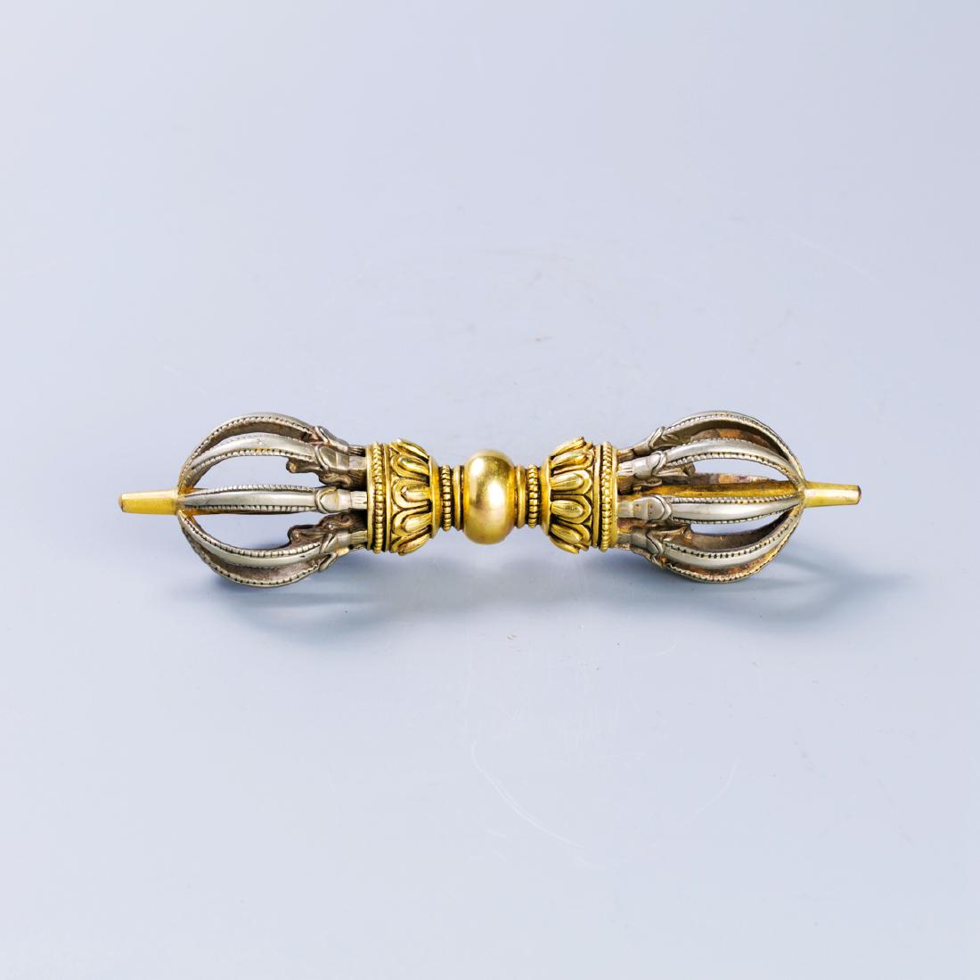 A CHINESE GILT BRONZE TOOL (1 of 6)