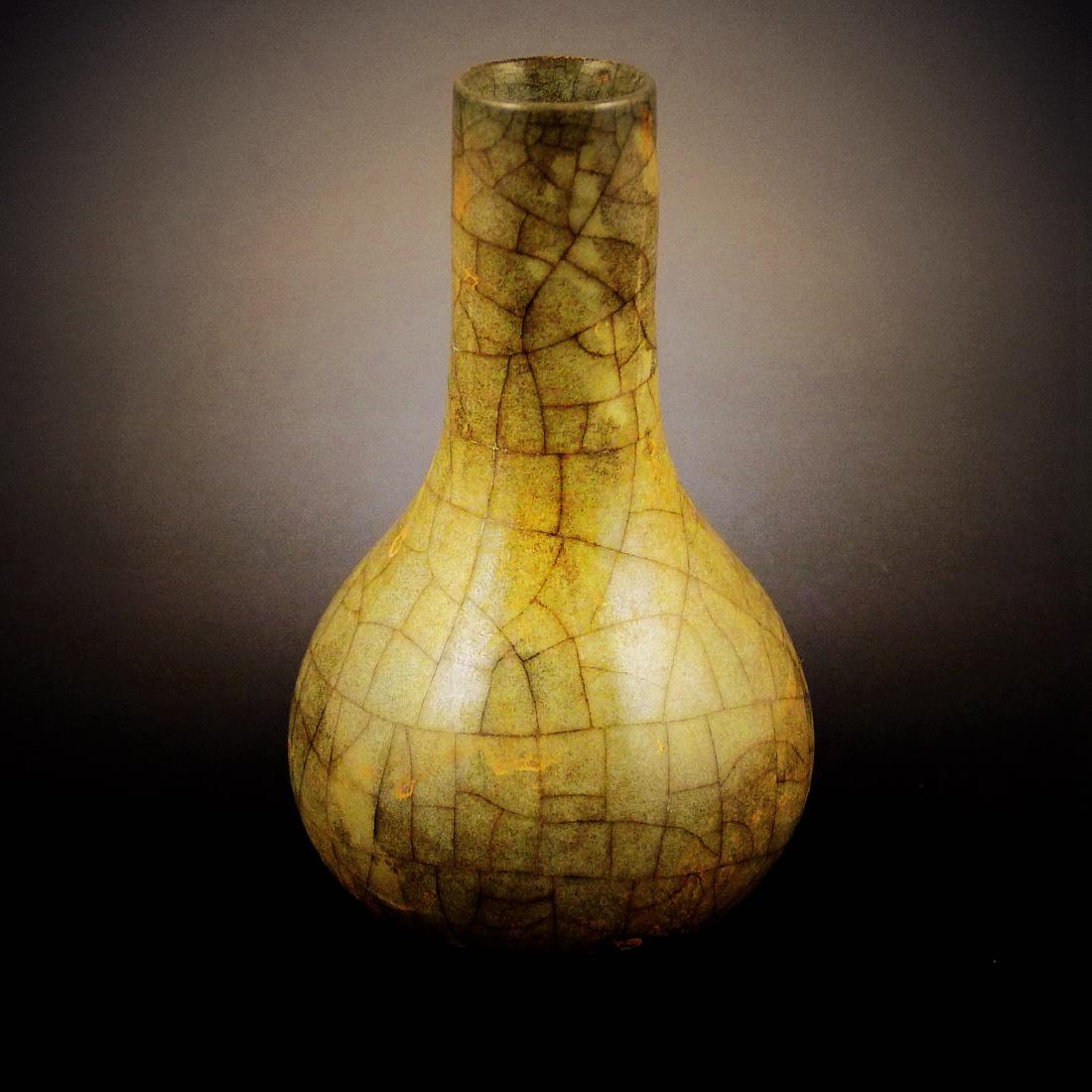 Song Dynasty Ge Kiln Open Pieces Vase: 宋代哥窑开片瓶Song Dynasty Ge Kiln Open Pieces Vase; Dimension: height:119mm.