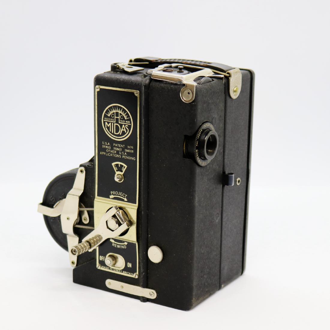 CAMERA PROJECTOR LIMITED (England): A MIDAS 9.5MM MOVIE: Excellent condition Midas Camera Projector in the original box, serial # 7165. The Camera-Projector comes with the 2 empty spools in original mailing box, full instruction manual with a copyright of 1