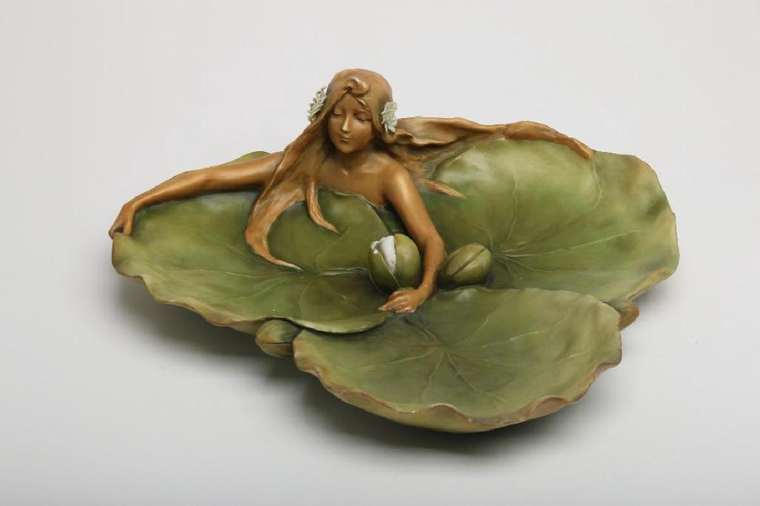 Ernest Wahliss Amphora Card Tray with Water Sprite: Ernst Wahliss Amphora Bohemian porcelain card tray with water sprite glazed in green and ochre. 13" x 14" x 4". Pictured: Ceramics From the House of Amphora 1890-1915, by Richard L Scott page 282.