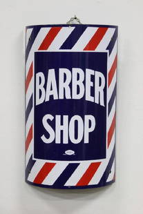 William Marvy Curved Enamel Barber Pole Shop Sign: Curved enamel on metal Barber Shop sign by William Marvy company with hardware to attach to a pole. Measures 24" x 14". Property from the estate of Walt Disney Imagineer John Patrick Burke.