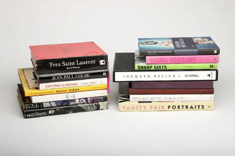 Lot 33 Hardcover Books Fashion and Photography: Lot of 33 hardcover books. Subjects are Fashion and Photography. Titles include: Yves Saint Laurent, David Teboul, Jean-Paul Goude: A Retro-Spective, Thames & Hudson, Cutting A Figure: Fashioning