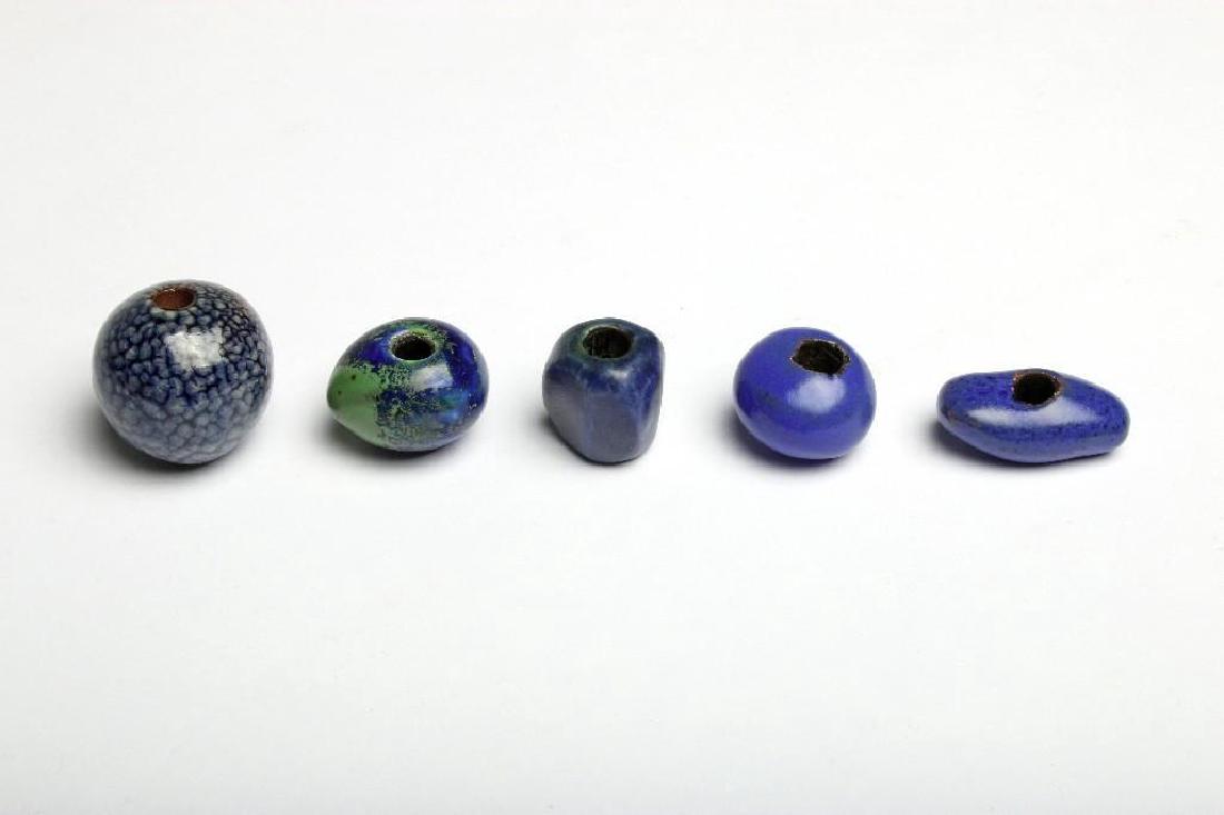 Doyle Lane California MCM Handmade Beads Cobalt Blue: Doyle Lane (20thCentury, California) handmade studio pottery beads with cobalt blue glaze. Five beads, assorted shapes and sizes.