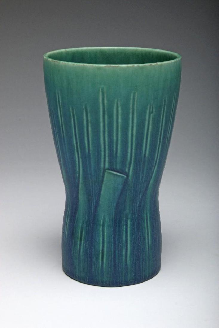 SAXBO Denmark Art Pottery Vase Eva Staehr Nielsen: Vintage Eva Staehr Nielsen for Saxbo art pottery vase with incised details, covered in blue-green glaze. Base is marked with Saxbo hallmark and artist's initials. Measures 8" high 4 3/4" in diameter.