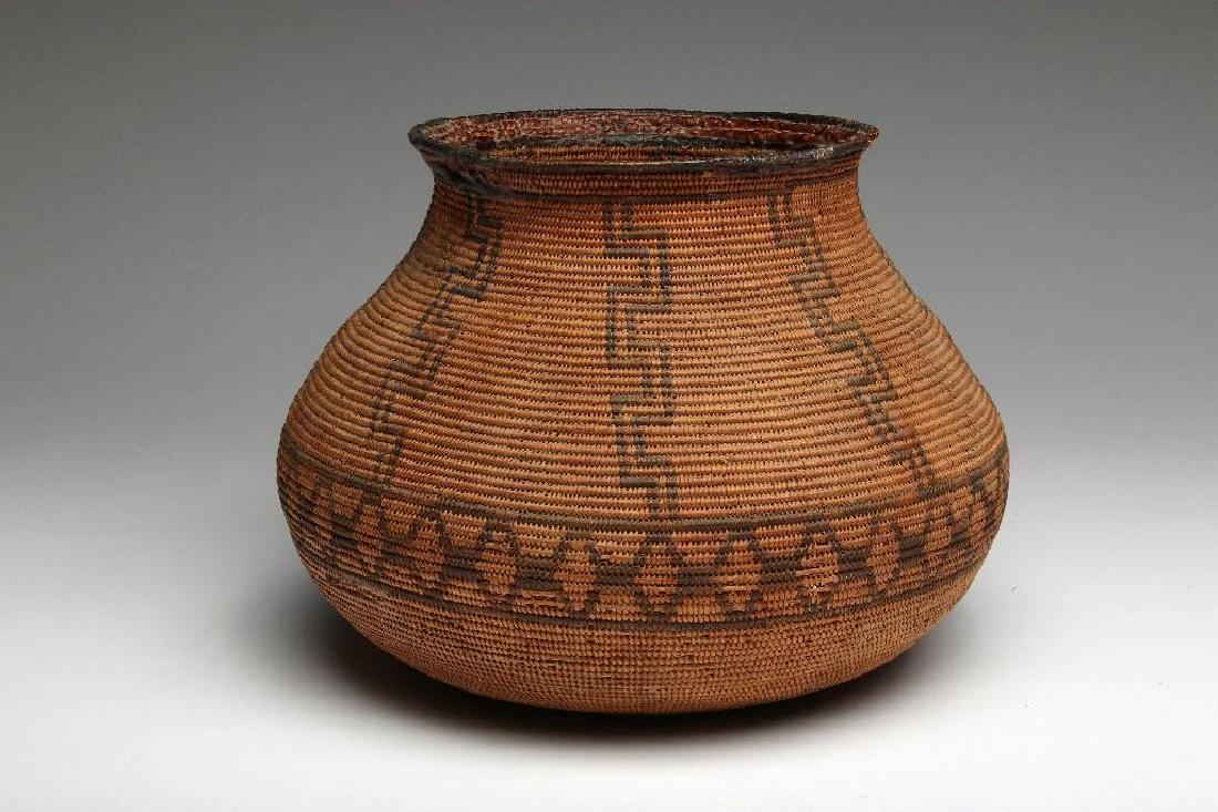 Antique Native American Indian Hand Woven Basket: Antique Native American Indian finely patterned woven basketry pot. Measures approx, 9in. high x 12in. diameter.