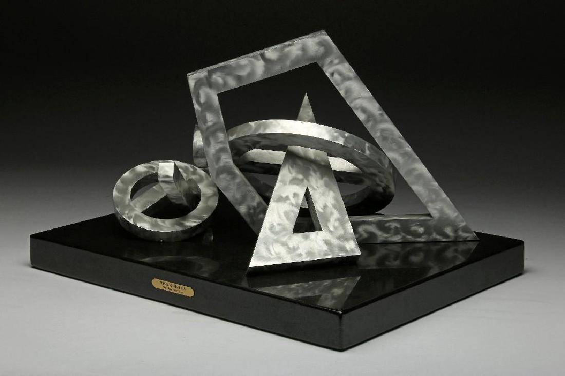 Ellie Riley Lyrical Expression 1994 Aluminum Sculpture: Ellie Riley (20th Century, California) Lyrical Expression II, 1994. Geometric abstract aluminum sculpture, 13 1/2in. x 16in. x 21in.