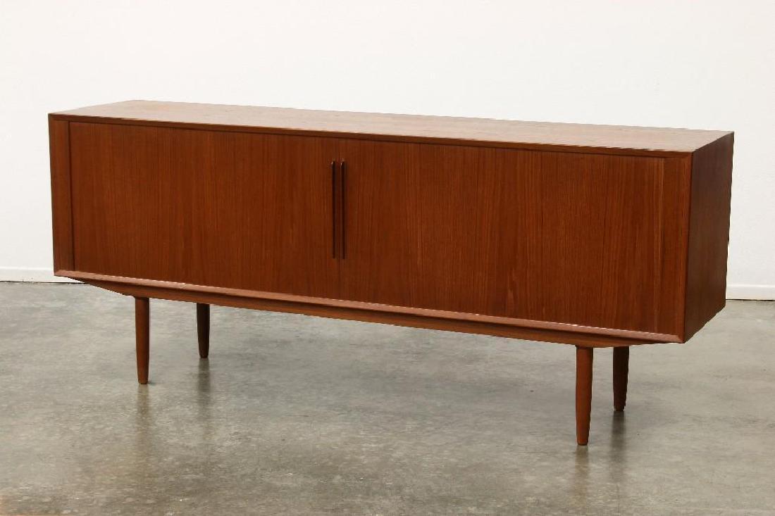 Danish Modern Group Tambour Crendenza and Cabinet: Vintage Danish Modern low credenza on tapered legs with double tambour doors and interior shelves (77 1/4in. x 19in. x 32 5/8in. high), along with a compact double door cabinet (33 1/4in. x 16 5/8in. 