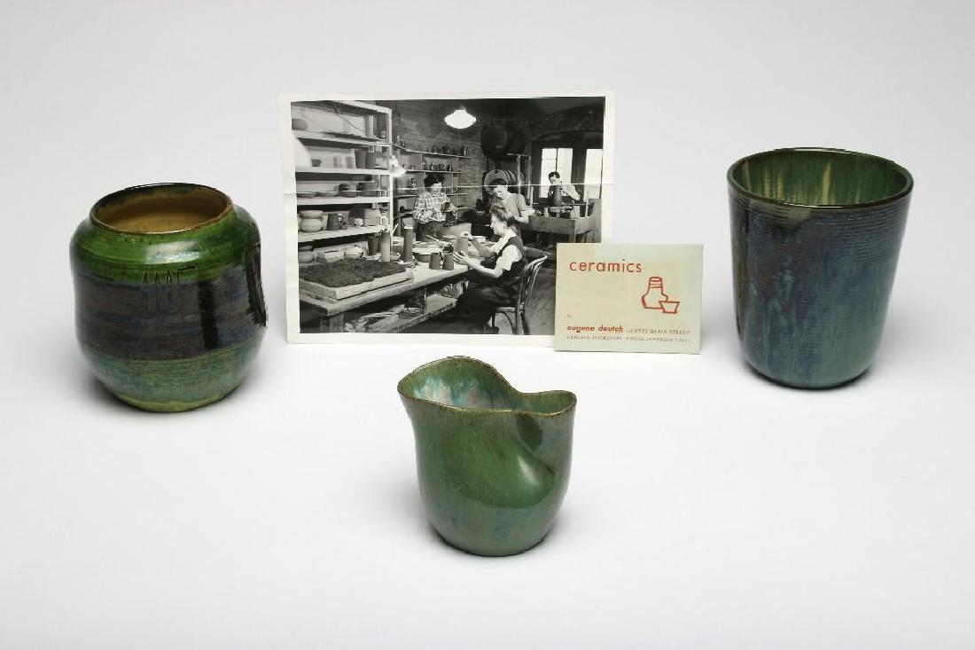 Collection Eugene Deutch Vintage Studio Pottery: Three piece collection of vintage studio pottery by ceramic artist Eugene Deutch. Glazed in shades of green. 1) 5.5 in. H x 4.75 in. dia. 2) 5.25 in. H x 4.75 in. dia. 3) 3.5 in. H x 4 in. W x 2.5 in.
