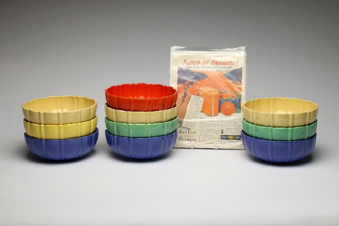 Group of 10 Sunkist Catalina Pottery Salad Bowls,: Group of pottery for Sunkist family size 10 inch fruit bowls. Catalina: 3 yellow, 3 blue, 1 green. Fiesta: 1 green, 1 yellow. Gladding McBean: 1 orange. Bowls: 3.75 in. H x 10 in. dia. ea. Ad: 13.75 i