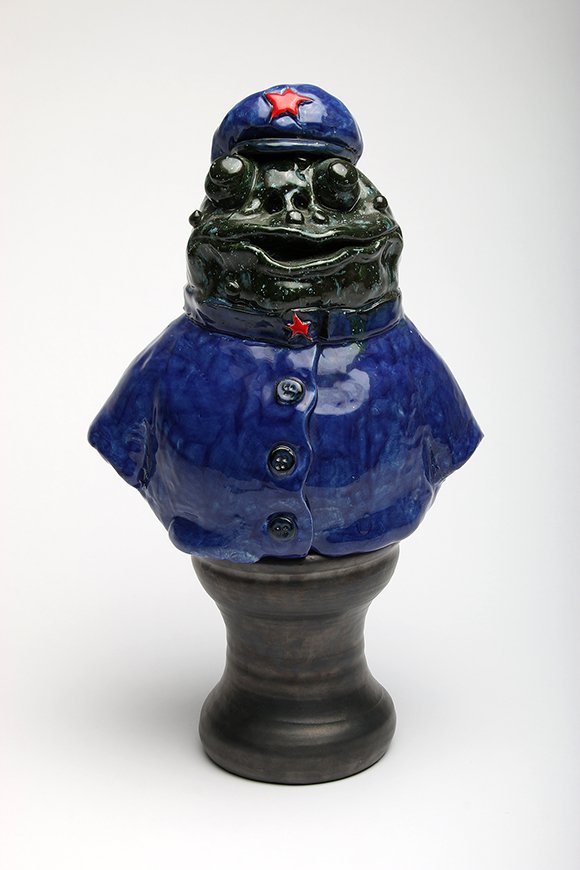 David James Gilhooly Frog Policeman Clay Sculpture: David James Gilhooly (1943-2013, Oregon / California) clay sculpture, policeman frog with stand. 17 in. H x 10 in. W x 7 in. D.