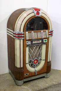 1940s Wurlitzer Juke Box Model 1015: Vintage 1940s Wurlitzer jukebox, model 1015. Bubbler with changing lights. 59 in. H x 33 in. W x 23 in. D.