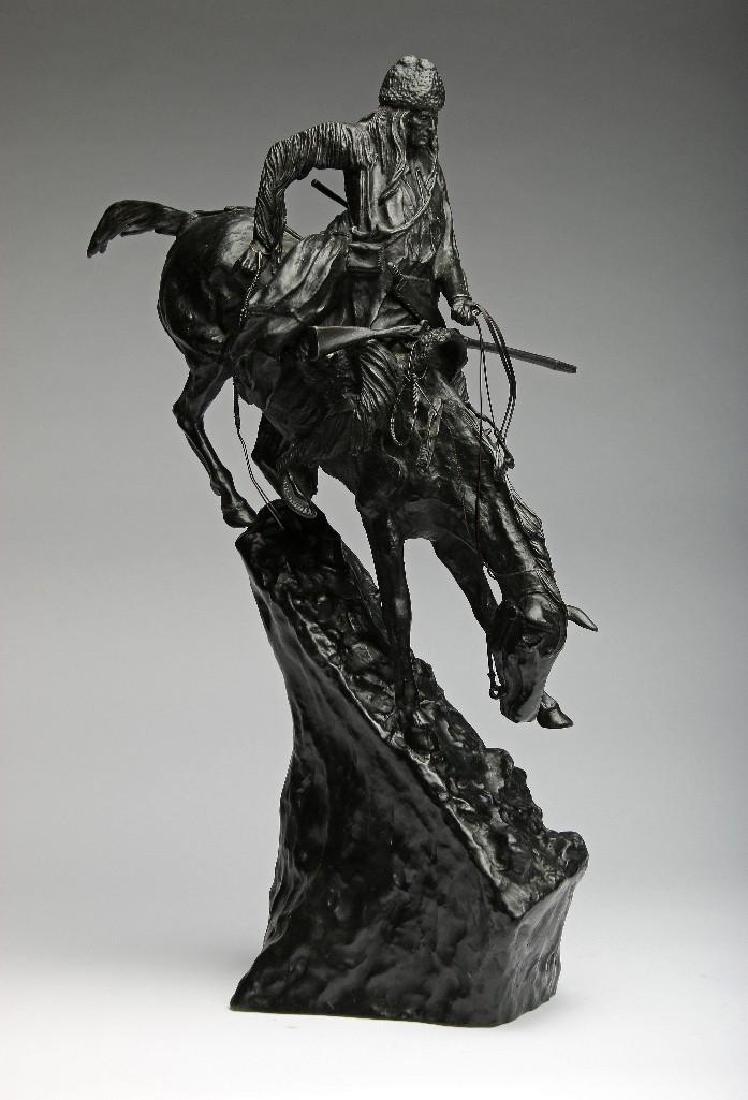 Frederic Remington Mountain Man Western Bronze: After Frederic Remington (1861-1909) Mountain Man bronze. Later casting, impressed signature and copyright. 27 in. H x 19 in. W x 9.5 in. D (at widest points).