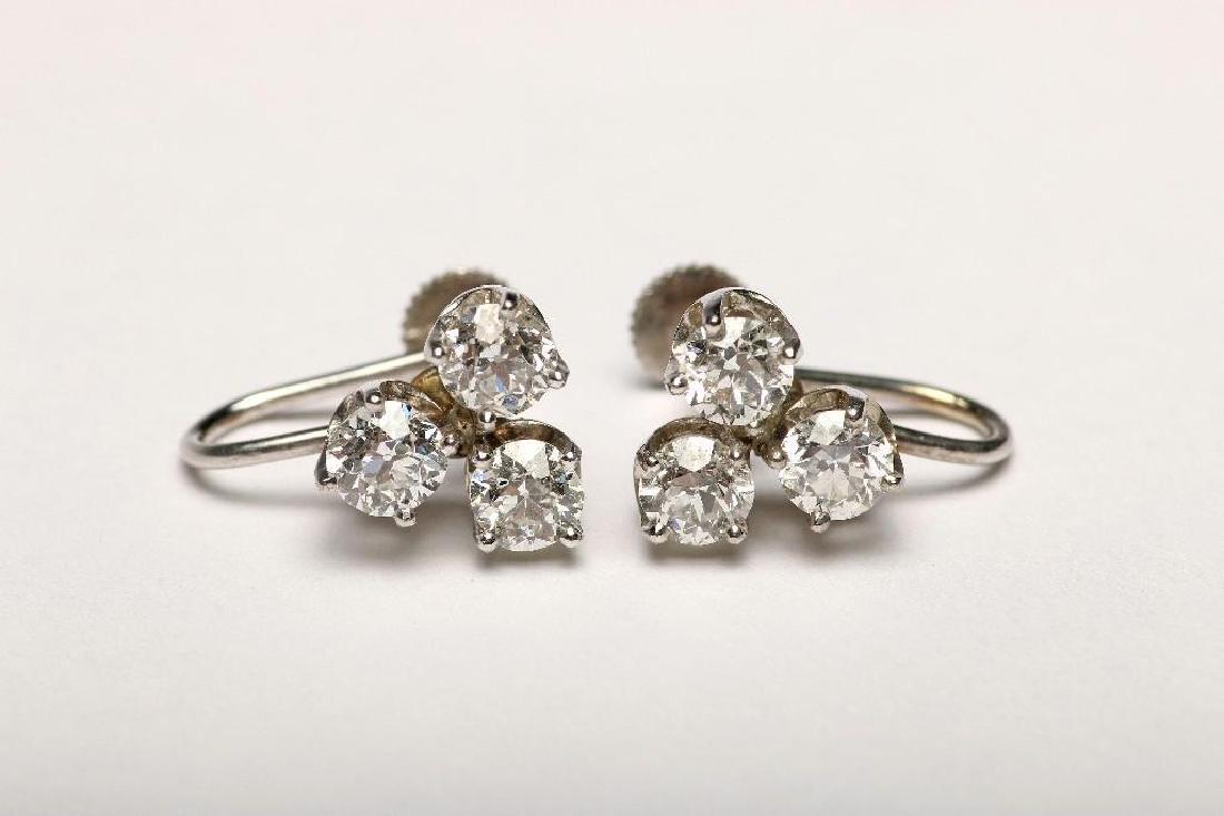Estate Diamond Three Stone Cluster Earrings 2.20 cts: Pair of estate diamond earrings, three stone cluster totaling 2.20 cts. Approx. H-I, SI.
