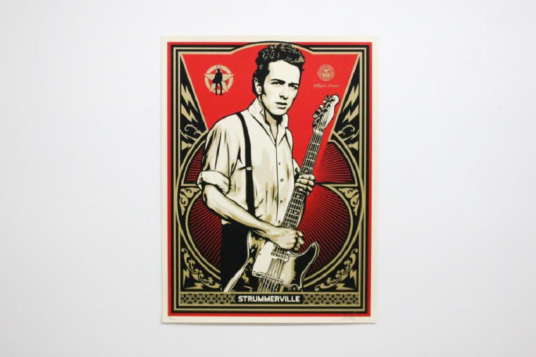 Shepard Fairey Obey Strummerville Screen Print Poster: Shepard Fairey (b. 1970 California/South Carolina). Strummerville, Joe Strummer of the Clash. Limited edition screen print on speckletone paper. Based on a photo by Kate Simon. Numbered 157 of 450. Si