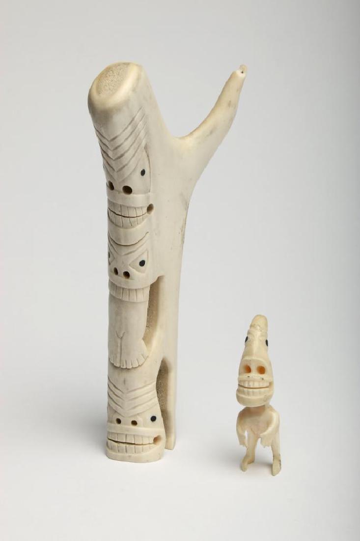 Pair of Greenland Inuit Tupilak Carved Bone Figures: Pair of Greenland Inuit Tupilak Carved Bone Figures. 1) 3 in. H x .75 in. W x 1.25 in. D, 2)7.5 in. H x 1.5 in. W x 3.5 in. D.
