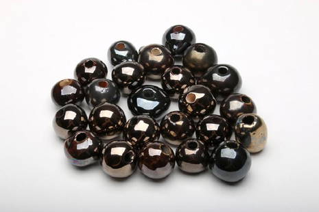 Doyle Lane 24 Iridescent Art Pottery Beads: Doyle Lane (American, 1925-2002). Approximately .75-1 in. H x .75-1.125 in. W x .75-1.25 in. D each.