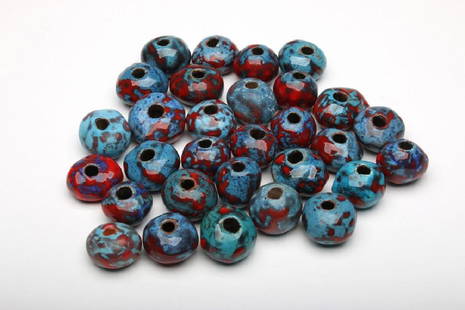 Doyle Lane 30 Blue/Red Art Pottery Beads: Doyle Lane (American, 1925-2002). Approximately .75 in. H x 1-1.25 in. Dia. each.