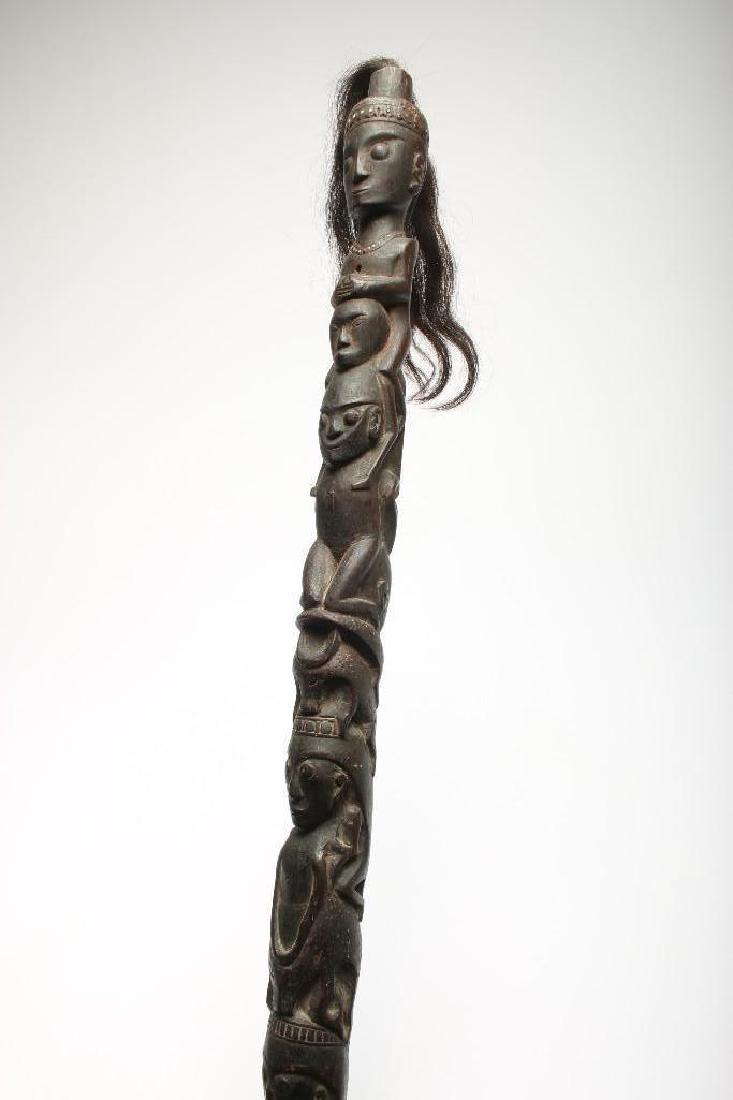 Batak Shaman Staff Tunggal Panaluan: Approx. 79 in Long. A tunggal panaluan is a magic staff used by shamans of the Batak people, who live in the highlands of North Sumatra, Indonesia. Traditionally the tunggal panaluan is made from wood